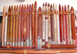 Rack of Native American Flutes by Lauging Crow